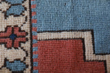 Vintage Turkish rug in living room setting, old rug, antique rug, pastel colors, faded colors, Turkish rug, vintage rug, soft rug, Portland, Oregon, rug store, rug shop, local shop