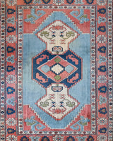 Vintage Turkish rug in living room setting, old rug, antique rug, pastel colors, faded colors, Turkish rug, vintage rug, soft rug, Portland, Oregon, rug store, rug shop, local shop