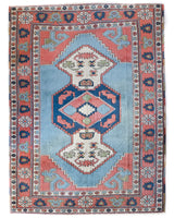 Vintage Turkish rug in living room setting, old rug, antique rug, pastel colors, faded colors, Turkish rug, vintage rug, soft rug, Portland, Oregon, rug store, rug shop, local shop