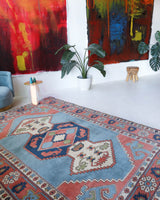 Vintage Turkish rug in living room setting, old rug, antique rug, pastel colors, faded colors, Turkish rug, vintage rug, soft rug, Portland, Oregon, rug store, rug shop, local shop