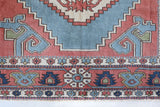 Vintage Turkish rug in living room setting, old rug, antique rug, pastel colors, faded colors, Turkish rug, vintage rug, soft rug, Portland, Oregon, rug store, rug shop, local shop