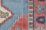 Vintage Turkish rug in living room setting, old rug, antique rug, pastel colors, faded colors, Turkish rug, vintage rug, soft rug, Portland, Oregon, rug store, rug shop, local shop