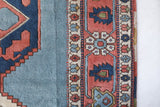 Vintage Turkish rug in living room setting, old rug, antique rug, pastel colors, faded colors, Turkish rug, vintage rug, soft rug, Portland, Oregon, rug store, rug shop, local shop