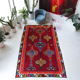 Vintage kilim rug in living room setting, bright colors, wild shaman, soft rug, bold color, Portland, Oregon, rug store, rug shop, local shop, vintage rug, modern kilim, warm colors, antique rug, antique kilimVintage kilim rug in living room setting, bright colors, wild shaman, soft rug, bold color, Portland, Oregon, rug store, rug shop, local shop, vintage rug, modern kilim, warm colors, antique rug, antique kilim