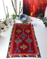 Vintage kilim rug in living room setting, bright colors, wild shaman, soft rug, bold color, Portland, Oregon, rug store, rug shop, local shop, vintage rug, modern kilim, warm colors, antique rug, antique kilimVintage kilim rug in living room setting, bright colors, wild shaman, soft rug, bold color, Portland, Oregon, rug store, rug shop, local shop, vintage rug, modern kilim, warm colors, antique rug, antique kilim