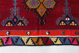 Vintage kilim rug in living room setting, bright colors, wild shaman, soft rug, bold color, Portland, Oregon, rug store, rug shop, local shop, vintage rug, modern kilim, warm colors, antique rug, antique kilim