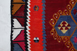 Vintage kilim rug in living room setting, bright colors, wild shaman, soft rug, bold color, Portland, Oregon, rug store, rug shop, local shop, vintage rug, modern kilim, warm colors, antique rug, antique kilim