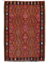 Vintage kilim rug in living room setting, bright colors, wild shaman, soft rug, bold color, Portland, Oregon, rug store, rug shop, local shop, vintage rug, modern kilim, warm colors, antique rug, antique kilim