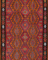 Vintage kilim rug in living room setting, bright colors, wild shaman, soft rug, bold color, Portland, Oregon, rug store, rug shop, local shop, vintage rug, modern kilim, warm colors, antique rug, antique kilim