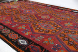 Vintage kilim rug in living room setting, bright colors, wild shaman, soft rug, bold color, Portland, Oregon, rug store, rug shop, local shop, vintage rug, modern kilim, warm colors, antique rug, antique kilim