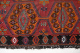 Vintage kilim rug in living room setting, bright colors, wild shaman, soft rug, bold color, Portland, Oregon, rug store, rug shop, local shop, vintage rug, modern kilim, warm colors, antique rug, antique kilim