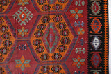 Vintage kilim rug in living room setting, bright colors, wild shaman, soft rug, bold color, Portland, Oregon, rug store, rug shop, local shop, vintage rug, modern kilim, warm colors, antique rug, antique kilim