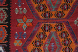Vintage kilim rug in living room setting, bright colors, wild shaman, soft rug, bold color, Portland, Oregon, rug store, rug shop, local shop, vintage rug, modern kilim, warm colors, antique rug, antique kilim