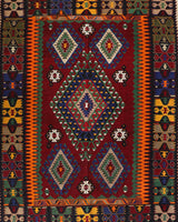 Vintage kilim rug in living room setting, bright colors, wild shaman, soft rug, bold color, Portland, Oregon, rug store, rug shop, local shop, vintage rug, modern kilim, warm colors, antique rug, antique kilim