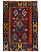 Vintage kilim rug in living room setting, bright colors, wild shaman, soft rug, bold color, Portland, Oregon, rug store, rug shop, local shop, vintage rug, modern kilim, warm colors, antique rug, antique kilim