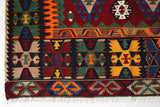 Vintage kilim rug in living room setting, bright colors, wild shaman, soft rug, bold color, Portland, Oregon, rug store, rug shop, local shop, vintage rug, modern kilim, warm colors, antique rug, antique kilim