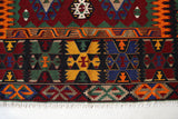 Vintage kilim rug in living room setting, bright colors, wild shaman, soft rug, bold color, Portland, Oregon, rug store, rug shop, local shop, vintage rug, modern kilim, warm colors, antique rug, antique kilim