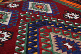Vintage kilim rug in living room setting, bright colors, wild shaman, soft rug, bold color, Portland, Oregon, rug store, rug shop, local shop, vintage rug, modern kilim, warm colors, antique rug, antique kilim