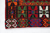 Vintage kilim rug in living room setting, bright colors, wild shaman, soft rug, bold color, Portland, Oregon, rug store, rug shop, local shop, vintage rug, modern kilim, warm colors, antique rug, antique kilim