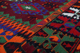 Vintage kilim rug in living room setting, bright colors, wild shaman, soft rug, bold color, Portland, Oregon, rug store, rug shop, local shop, vintage rug, modern kilim, warm colors, antique rug, antique kilim