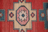 Vintage Turkish runner rug in living room setting, old rug, antique rug, pastel colors, faded colors, Turkish rug, vintage rug, soft rug, Portland, Oregon, rug store, rug shop, local shop