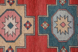 Vintage Turkish runner rug in living room setting, old rug, antique rug, pastel colors, faded colors, Turkish rug, vintage rug, soft rug, Portland, Oregon, rug store, rug shop, local shop