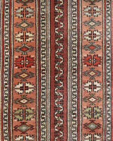 Vintage Turkish runner rug in living room setting, old rug, antique rug, pastel colors, faded colors, Turkish rug, vintage rug, soft rug, Portland, Oregon, rug store, rug shop, local shop