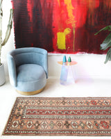 Vintage Turkish runner rug in living room setting, old rug, antique rug, pastel colors, faded colors, Turkish rug, vintage rug, soft rug, Portland, Oregon, rug store, rug shop, local shop