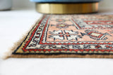 Vintage Turkish runner rug in living room setting, old rug, antique rug, pastel colors, faded colors, Turkish rug, vintage rug, soft rug, Portland, Oregon, rug store, rug shop, local shop
