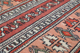 Vintage Turkish runner rug in living room setting, old rug, antique rug, pastel colors, faded colors, Turkish rug, vintage rug, soft rug, Portland, Oregon, rug store, rug shop, local shop