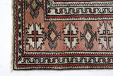 Vintage Turkish runner rug in living room setting, old rug, antique rug, pastel colors, faded colors, Turkish rug, vintage rug, soft rug, Portland, Oregon, rug store, rug shop, local shop
