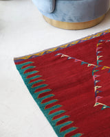 Vintage kilim rug in living room setting, bright colors, wild shaman, soft rug, bold color, Portland, Oregon, rug store, rug shop, local shop, vintage rug, modern kilim, warm colors, antique kilim rug