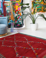 Vintage kilim rug in living room setting, bright colors, wild shaman, soft rug, bold color, Portland, Oregon, rug store, rug shop, local shop, vintage rug, modern kilim, warm colors, antique kilim rug