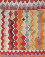Vintage kilim rug in living room setting, old rug, antique rug, pastel colors, faded colors, Turkish rug, vintage rug, soft rug, Portland, Oregon, rug store, rug shop, local shop, earthy tones, earthy colors, warm colors