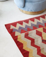 Vintage kilim rug in living room setting, old rug, antique rug, pastel colors, faded colors, Turkish rug, vintage rug, soft rug, Portland, Oregon, rug store, rug shop, local shop, earthy tones, earthy colors, warm colors