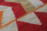 Vintage kilim rug in living room setting, old rug, antique rug, pastel colors, faded colors, Turkish rug, vintage rug, soft rug, Portland, Oregon, rug store, rug shop, local shop, earthy tones, earthy colors, warm colors