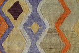 Vintage kilim rug in living room setting, old rug, antique rug, pastel colors, faded colors, Turkish rug, vintage rug, soft rug, Portland, Oregon, rug store, rug shop, local shop, earthy tones, earthy colors, warm colors