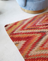 Vintage kilim rug in room decor setting, old rug, antique rug, pastel colors, faded colors, Turkish rug, vintage rug, soft rug, Portland, Oregon, rug store, rug shop, local shop,  antique kilim rug, bold colors, bright colors, faded colors