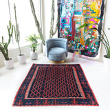 Vintage kilim rug in living room setting, bright colors, wild shaman, soft rug, bold color, Portland, Oregon, rug store, rug shop, local shop, vintage rug, modern kilim, warm colors, antique kilim rug