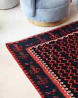 Vintage kilim rug in living room setting, bright colors, wild shaman, soft rug, bold color, Portland, Oregon, rug store, rug shop, local shop, vintage rug, modern kilim, warm colors, antique kilim rug