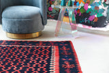 Vintage kilim rug in living room setting, bright colors, wild shaman, soft rug, bold color, Portland, Oregon, rug store, rug shop, local shop, vintage rug, modern kilim, warm colors, antique kilim rug