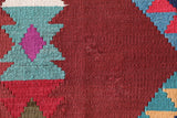 Vintage kilim rug in living room setting, bright colors, wild shaman, soft rug, bold color, Portland, Oregon, rug store, rug shop, local shop, vintage rug, modern kilim, warm colors, antique rug, antique kilim