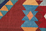 Vintage kilim rug in living room setting, bright colors, wild shaman, soft rug, bold color, Portland, Oregon, rug store, rug shop, local shop, vintage rug, modern kilim, warm colors, antique rug, antique kilim