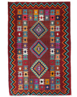 Vintage kilim rug in living room setting, bright colors, wild shaman, soft rug, bold color, Portland, Oregon, rug store, rug shop, local shop, vintage rug, modern kilim, warm colors, antique rug, antique kilim