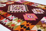 Vintage kilim rug in living room setting, bright colors, wild shaman, soft rug, bold color, Portland, Oregon, rug store, rug shop, local shop, vintage rug, modern kilim, warm colors, antique rug, antique kilim