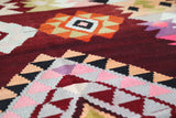 Vintage kilim rug in living room setting, bright colors, wild shaman, soft rug, bold color, Portland, Oregon, rug store, rug shop, local shop, vintage rug, modern kilim, warm colors, antique rug, antique kilim