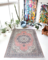 Vintage Turkish rug in living room setting, old rug, antique rug, pastel colors, faded colors, Turkish rug, vintage rug, soft rug, Portland, Oregon, rug store, rug shop, local shop