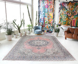 Vintage Turkish rug in living room setting, old rug, antique rug, pastel colors, faded colors, Turkish rug, vintage rug, soft rug, Portland, Oregon, rug store, rug shop, local shop
