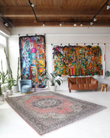 Vintage Turkish rug in living room setting, old rug, antique rug, pastel colors, faded colors, Turkish rug, vintage rug, soft rug, Portland, Oregon, rug store, rug shop, local shop