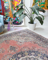Vintage Turkish rug in living room setting, old rug, antique rug, pastel colors, faded colors, Turkish rug, vintage rug, soft rug, Portland, Oregon, rug store, rug shop, local shop
